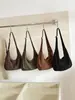 Nuevo bolso de hombro de gamuza 2026 para mujer, bolso cruzado retro de gran capacidad, estilo coreano, bolso tipo albóndiga de cuero suave versátil para el trabajo