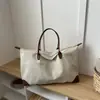 Bolsa Transfronteriza de Gran Capacidad para Mujer Otoño 2026 Nuevo Versátil Moda Hombro Único Tendencia Viaje de Negocios Retro Casual Bolsa de Mano