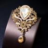 Broche de gota de agua de cristal pesado moda otoño e invierno accesorios de ropa corsage de mujer multicolor opcional al por mayor