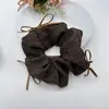 Goma para el pelo con estampado de leopardo y lazo transfronteriza para mujer, vintage, ligera y esponjosa, versátil para el uso diario, sujetador de pelo, venta al por mayor