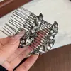 Pente de cabelo elegante com folha de strass preto para mulheres, novo acessório de nicho para coques na parte de trás da cabeça, grampo de cabelo requintado