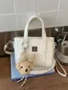 Bolso tipo cubo de alta gama para mujer 2026 Nuevo bolso de moda para ir al trabajo y uso casual, Elegante bolso cruzado de un solo hombro, Diseño simple