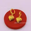 Pendientes de Corazón de Lujo Ligero de Nicho para Mujer, Estilo Europeo y Americano, Modernos y Versátiles, Clips para Orejas Sencillos con un Toque de Alta Gama y Elegante Diseño de Corazón de Melocotón