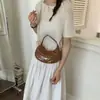 Bolso de Media Luna Acolchado Estilo Chanel para Mujer 2026 Nuevo Bolso Cruzado de Cadena de Moda con Acabado de Alta Gama Bolso de Hombro Único Tipo Dumpling