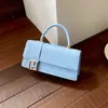 Bolso pequeño cuadrado tejido de color liso estilo europeo y americano con asa corta, tapa abatible y diseño de cierre, versátil para uso diario, bolso de mujer de un solo hombro o cruzado