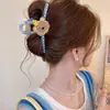 Lindo y elegante pinza de tiburón con forma de lazo, pinza para el pelo de moda con diseño floral, accesorio simple para peinados recogidos a medias