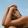 Nuevo brazalete de acero inoxidable estilo europeo y americano que no se decolora, moderno corazón, copo de nieve, trébol de cuatro hojas, perla colgante joyería para mujer
