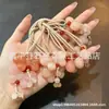 Colgante de flor de durazno de Xinjiang, colgante de Buda, candado de nube auspiciosa de flor de durazno, hebilla de paz de flor de durazno, colgante de jade de zorro de hoja