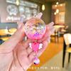 Botella de arena movediza creativa DIY Campana de viento aceite luminoso flotante llavero bolsa Colgante de coche pequeño regalo fabricante