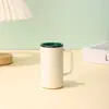 Nueva taza termo mini de acero inoxidable de pequeña capacidad de 2 oz transfronteriza, accesorio de viaje portátil con asa, taza de café