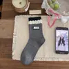 Calcetines de algodón para mujer de primavera y otoño con lazos, estilo coreano, ribete de encaje, longitud media, bloques de color, encaje, adecuados para combinar con zapatos pequeños de cuero, calcetines superpuestos