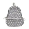 Nova mochila simples e estilosa com estampa de estrelas para estudantes, adequada para o uso diário no campus, grande capacidade, alto valor estético, design único e não repetitivo