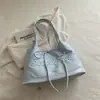 Bolsa de Axila Fashion e Estilosa para Mulheres 2026 Novo Modelo Grande Capacidade Laço Bolsa de Ombro de Lona Bolsa Tote Casual