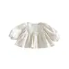 Camisa Texturizada para Muñeca de Niña 2026 Estilo Nuevo Camisa Lisa de Color Sólido Jacquard para Bebé Niña Overol Infantil zqy6250