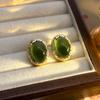 Pendientes vintage antiguos medios de alta fijación ovalados con textura ojo de tigre marcados Diseño nicho Lujo ligero Pendientes de alta gama