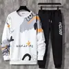 Estudiantes jóvenes traje deportivo informal de dos piezas con estampado nuevo para primavera y otoño para hombre manga larga cuello redondo venta al por mayor