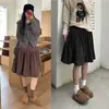 Nuevo falda midi versátil de lunares abullonada vintage de otoño con botones, falda de diseño único para mujer