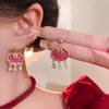 Pendientes Fuzi de perla de imitación con incrustaciones de diamantes rojos de Año Nuevo, elegantes pendientes chinos nuevos para mujer, pendientes de alta gama Sense Niche que combinan con todo.
