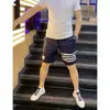 Pantalones cortos de verano de seda helada finos de secado rápido de cuatro barras para hombre estilo coreano modernos casuales pantalones de playa shorts deportivos para jóvenes