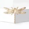 Broche de libélula calado de aleación esmaltada europeo y americano de gran venta transfronteriza, pin de joyería elegante para solapa de traje de dama
