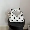 Bolso de lona de lunares de nicho transfronterizo nuevo para mujer, bolso cruzado moderno y a la moda, bolso de hombro simple y versátil, bolso tipo dumpling