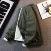 Chaqueta de béisbol color caqui Cleanfit para hombres y mujeres, nueva chaqueta casual versátil elegante de alta gama para primavera y otoño
