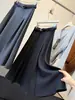 Traje Falda Nuevo Estilo Coreano Otoño 2026 Mujer Cintura Alta Adelgazante Para Viajar Caída Media Longitud Dobladillo Ancho Falda Paraguas