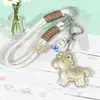 El artículo más popular para el Año del Caballo: Hazte rico al instante, vuélvete adinerado de inmediato, haz una fortuna pronto - llavero para teléfono, cordón para teléfono, colgante de bolsa dorado