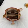 Bolso tipo cubo con monograma de diseño francés de alta calidad hecho de PVC duradero, popular en el sudeste asiático, bolso de un solo hombro, bolso cruzado para mujer