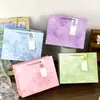 Bolsa de regalo horizontal de alta gama estilo ins de alto valor Día de San Valentín bolso de mano de alta gama tarjeta blanca bolsa de papel de cumpleaños venta al por mayor