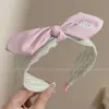 Diadema retorcida fresca y elegante, de lujo ligero para mujer, adecuada para el uso diario en primavera y verano, diadema de ala ancha, dulce accesorio para el cabello estilo coreano
