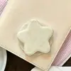 Superventas transfronterizo soporte magnético con airbag en forma de corazón con estampado de lunares de dibujos animados, soporte magnético para teléfono retráctil y plegable