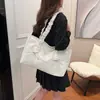 Niche Design Sweet Cool Style Bolsa de Grande Capacidade 2024 Novo Laço Plissado Ombro Trabalho Bolsa Tote Muter