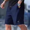 Pantalones cortos de punto gofrado para hombre, de verano, atléticos y casuales, de importación europea y americana, un artículo popular y de los más vendidos