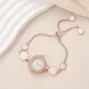 Fabricante Venta al por Mayor Pulsera Delgada con Concha en Forma de Flor Reloj de Mujer Cuerda de Tracción Libremente Ajustable Reloj de Mujer Incrustado con Diamantes Reloj de Mujer