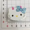 Lindo Gato KT Grande Lazo Acrílico DIY Pinza para el Cabello Accesorios para el Cabello Funda de Teléfono Charms para Zapatos Crocs Accesorios Venta al por Mayor DIY