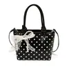 Bolsa de Mão Nova de Verão 2026 com Bolinhas Personalidade Feminina Estilo Coreano Design de Nicho Bolsa Transversal Moda Bolsa de Ombro Único Estilo Balde