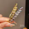 Pulsera con cierre de pinza cuadrada de circón chapada en oro real de 18 quilates, diseño de moda, lujo ligero, sensación de alta gama, accesorio de mano versátil