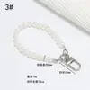 Lanyard de celular quente transfronteiriço, corrente de pulso para celular, corrente curta de metal e couro para capa de celular, fabricantes podem personalizar