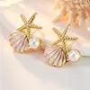 Nuevos pendientes de acero inoxidable con forma de estrella de mar, concha y perla, para mujer, estilo casual de moda playera y oceánica, pendientes con gota de aceite