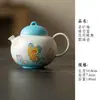 Juego de té de cerámica pintado a mano con esmalte azul cielo claro y diseño de mariposa, que incluye una taza con tapa, tetera, tazas de té y tazas de café