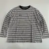 Camiseta de otoño nueva a rayas de manga larga, transpirable, para hombre y mujer, cuello redondo, corte holgado, top casual versátil, adelgazante para uso diario