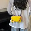 Bolso pequeño cuadrado de nuevo estilo coreano y japonés para mujer, bolso de mano popular cruzado al hombro, versátil y moderno para jóvenes 2026