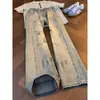 Jeans retro azules de corte diagonal para hombre, primavera y otoño, diseño elegante y genial, vibra de la alta calle americana, pierna recta, pantalones ligeramente acampanados
