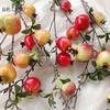 Simulación 7 ramas de granada ramas de fruta caqui falso decoración del hogar adornos de sala de estar arreglo floral de barril de la suerte fruta falsa al por mayor