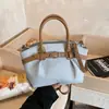 Bolsa de Mão Vintage Plissada Texturizada Nova da Moda Primavera 2026 Bolsa Tote Feminina Bolsa Transversal Versátil
