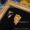Pendientes de esmalte con diseño de abanico dorado retro de 18 años chapados en cobre de la época occidental, con diseño de oro negro, sencillos y atmosféricos.