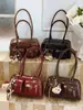 Bolsa de Axila Retrô de Nicho para Mulheres Outono/Inverno 2025 Nova Versátil Tendência Coreana Bolsa de Ombro Bolsa de Bowling de Grande Capacidade