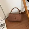 Tendencia Otoño 2026 Bolso Cruzado Versátil de un Solo Hombro para Mujer Bolso Cuadrado Pequeño Tejido Estilo de Viaje de Alta Calidad