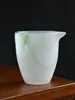 Taza de té de porcelana de jade vidriada verde, separador de té para uso doméstico, taza de té individual resistente al calor y que no quema